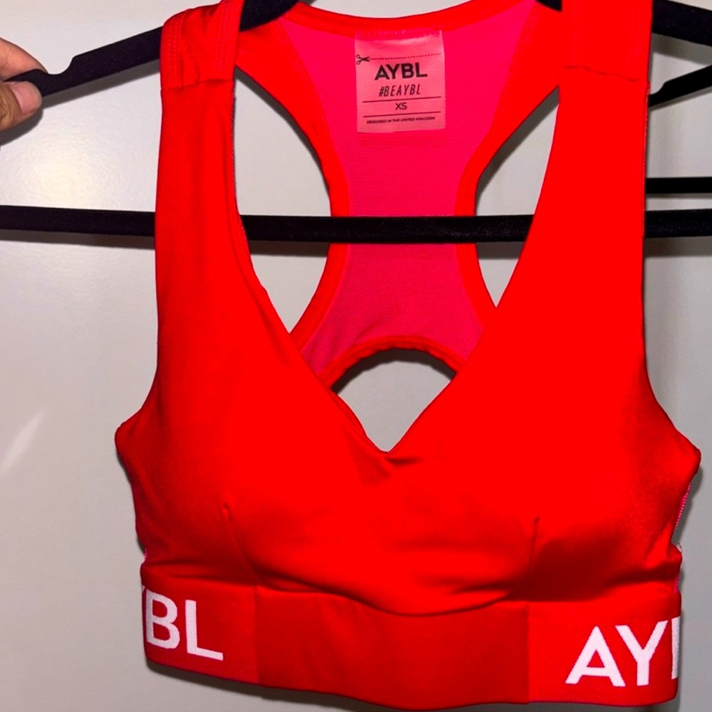 NWOT XS AYBL Red sports bra and shorts set